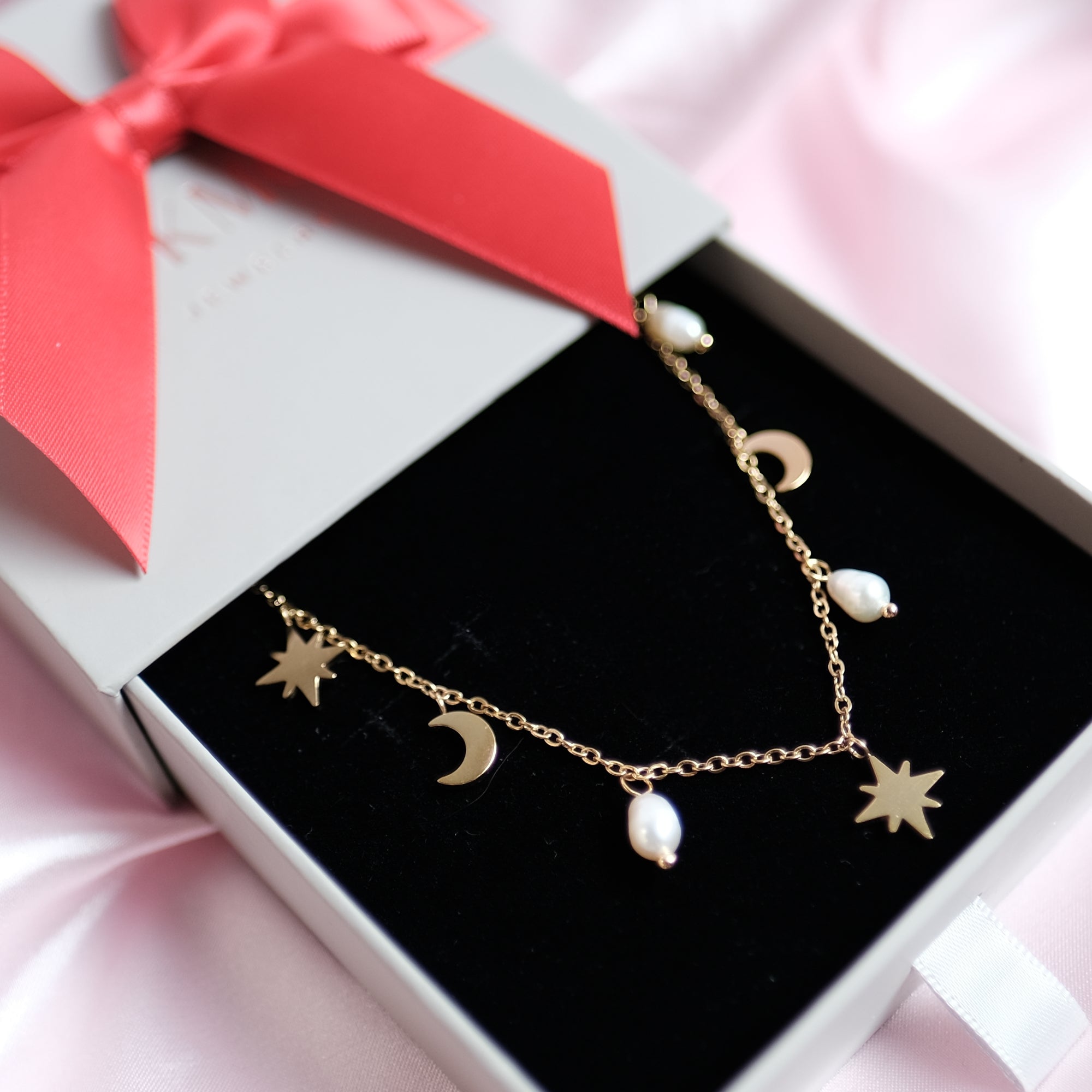 MOKMOK JEWELRY Festive Star and Moon Charm Freshwater Pearl Necklace