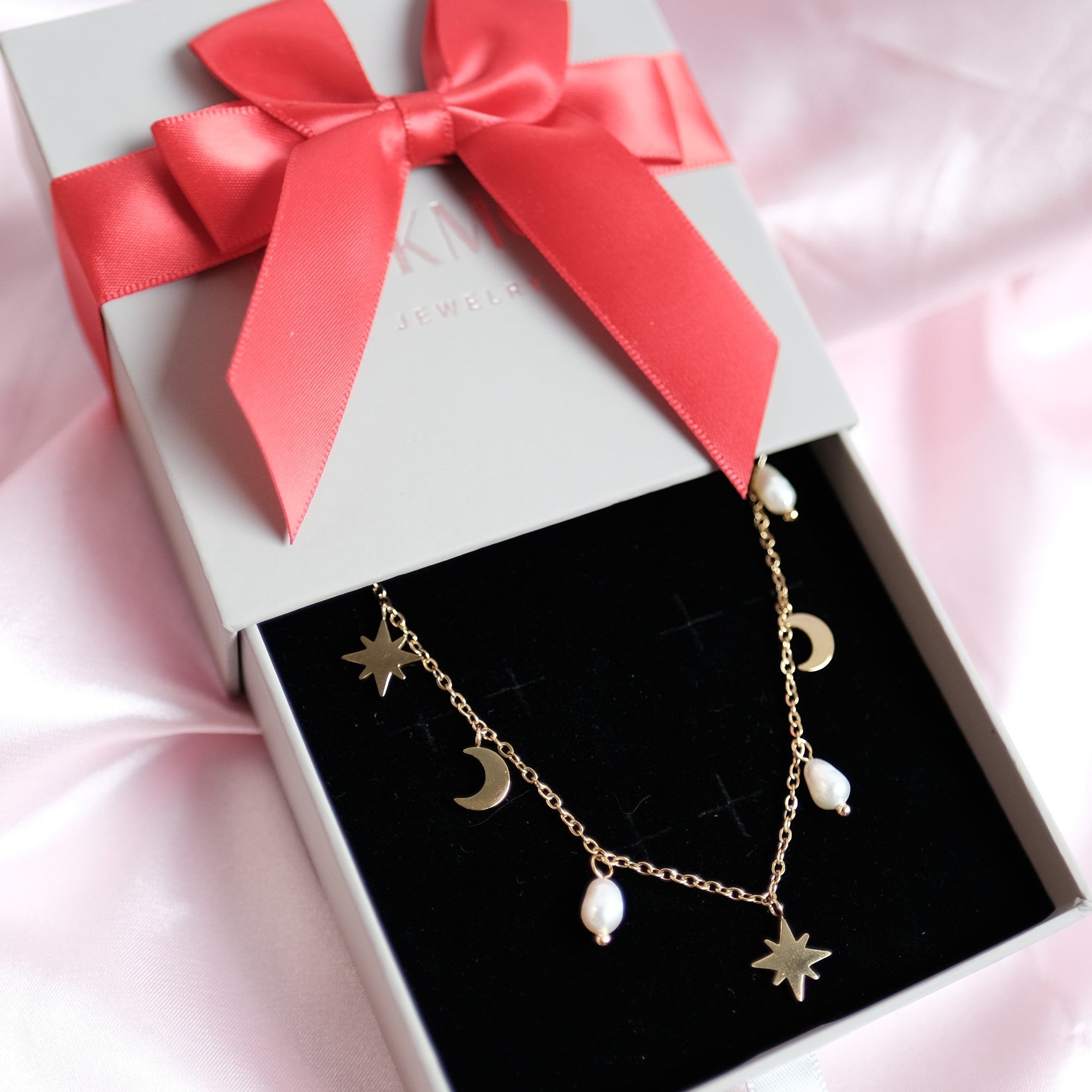 MOKMOK JEWELRY Festive Star and Moon Charm Freshwater Pearl Necklace